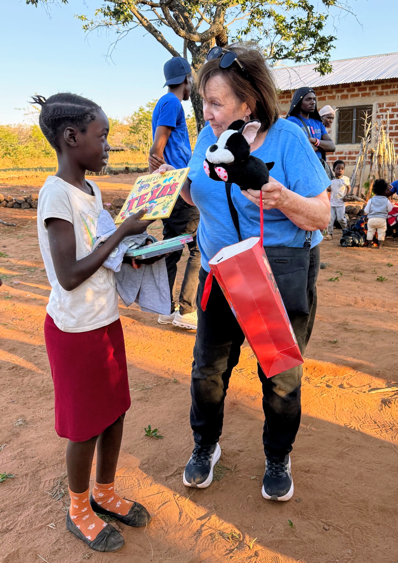Debbie connecting with a child during an Allies Adventure Trip