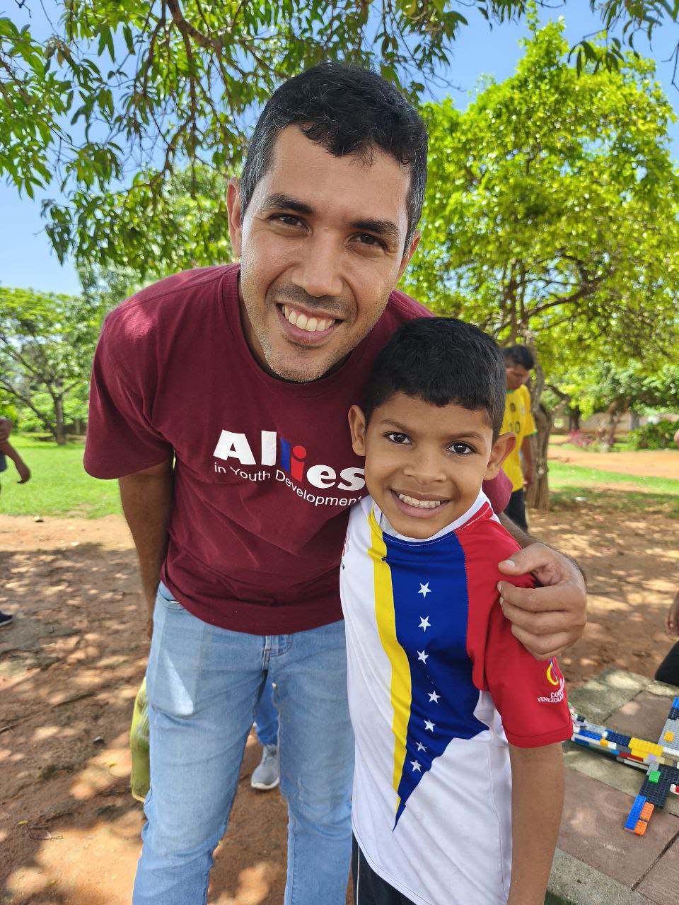 Allies mentor with child