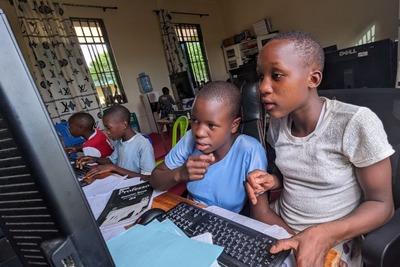 Orphans Learn Computer Skills