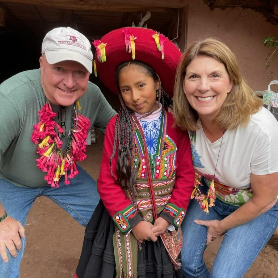 Allies supporters Jim and Julie Makens with their sponsored child, Mariela