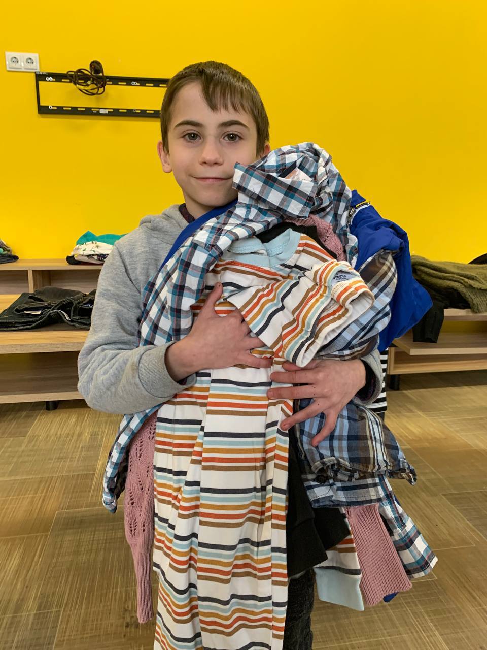 Child receiving clothing